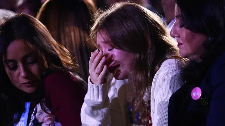 Supporters react to early election results at Democratic presidential nominee U.S. Vice President Kamala Harris' election night rally during the 2024 U.S. presidential election, at Howard University, in Washington, U.S., November 5, 2024. (REUTERS/Daniel Cole)